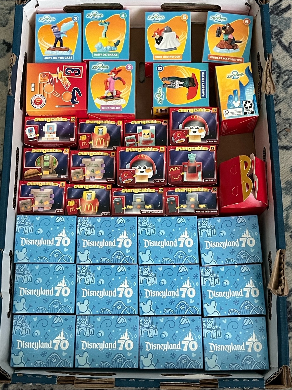 32 Boxes 45pc Total Blue Disneyland 70 McDonald
Surprise Mini Figure Blind Boxes